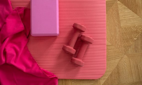 pink exercise mat with weights
